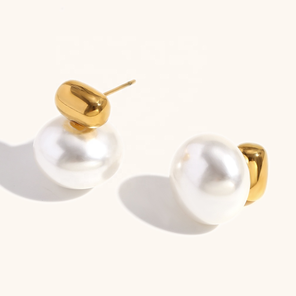 Pearl earrings with gold posts on a white background