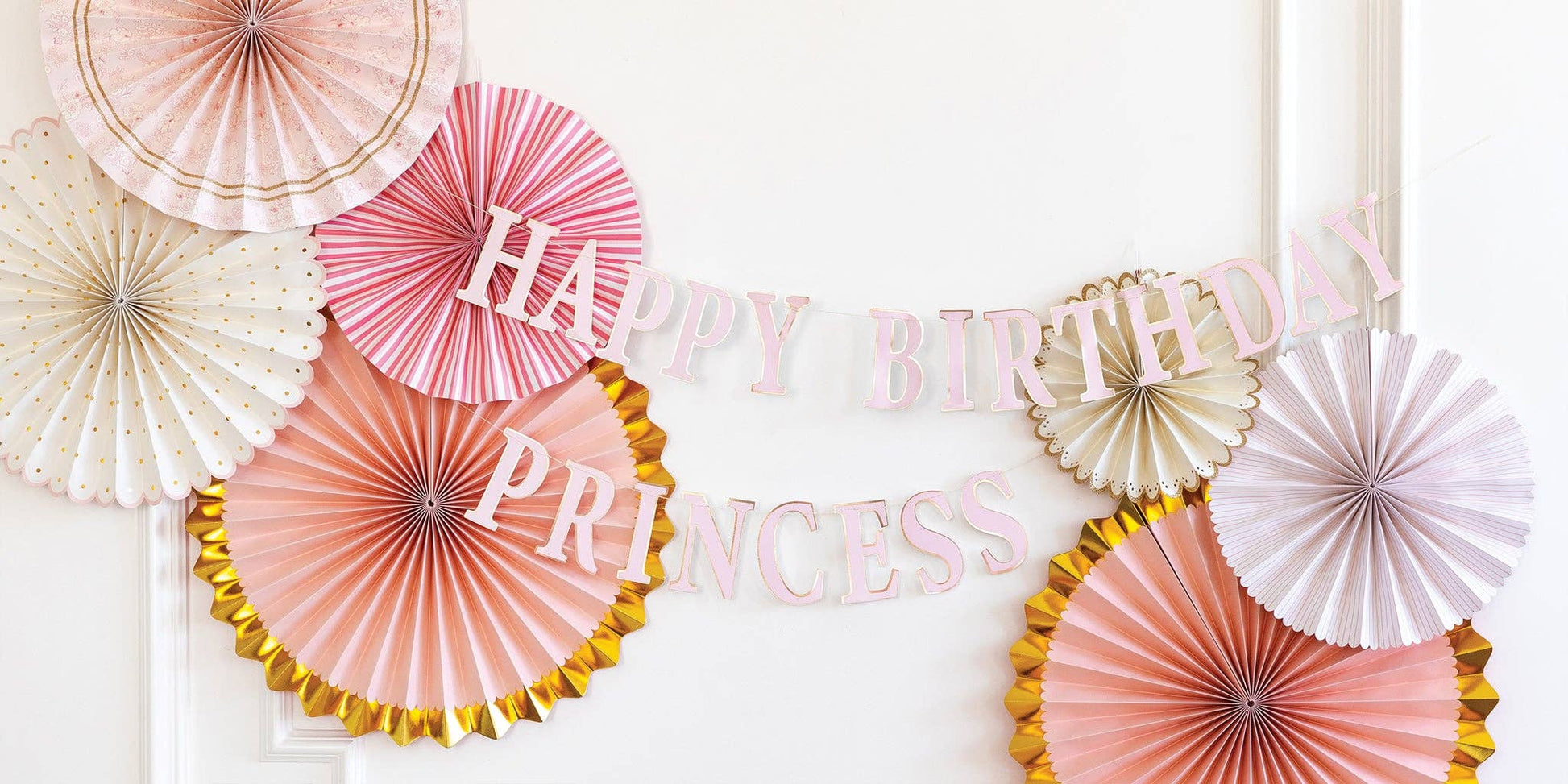 Decorative birthday banner with 'Happy Birthday Princess' text surrounded by colorful paper fans on a white background.
