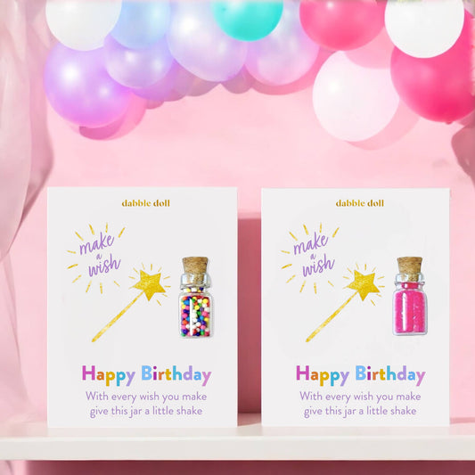 Two 'Happy Birthday' cards with colorful jars and stars against a pink background with balloons.